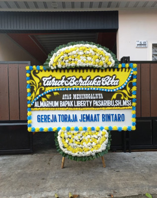 Papan Bunga Duka di Karusen Janang